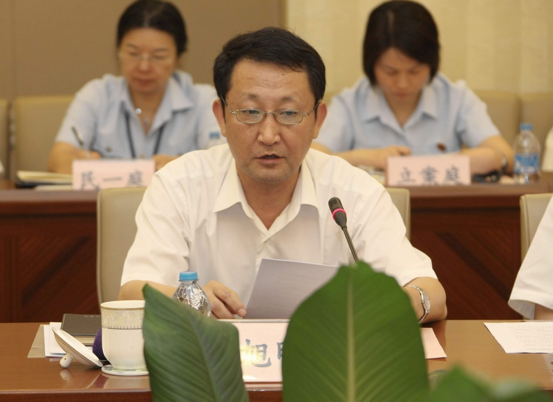 副院长沈志先作主题报告,高院审委会专职委员,审管办主任赵旭明发言